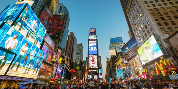 Wide angled shot of Times Square showing screens with detail